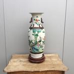 Chinese vaas op voet, Ophalen