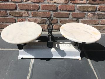 Oude “Force” weegschaal uit slagerij, Enlèvement