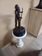 Bronze beeld, Ophalen