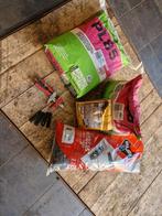 Tegellijm, voegmiddel + spieën en tang nivelleersysteem, Ophalen