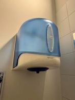 Deze dispenser is de Tork Reflex Centerfeed Dispenser,, Ophalen