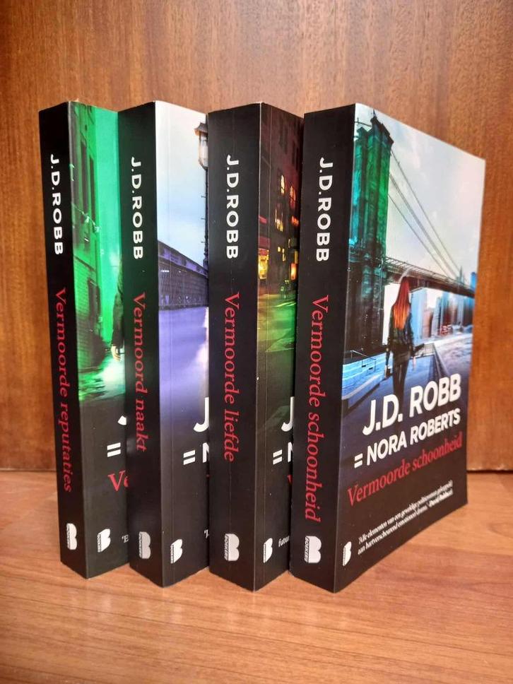 J.D. Robb (Nora Roberts) - 4 boeken 'Eve Dallas-reeks', Boeken, Thrillers, Zo goed als nieuw, Amerika, Verzenden