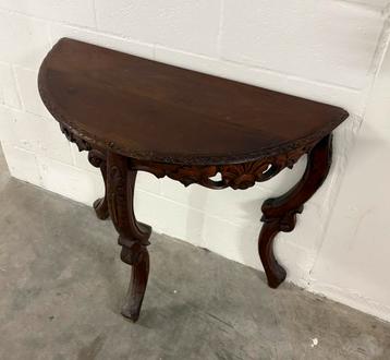 Console en bois foncé, Enlèvement