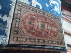 Tapis de Ghom en soie, Ophalen