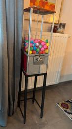 Kauwgomballen-Capsule automaat-Vending machine, Ophalen