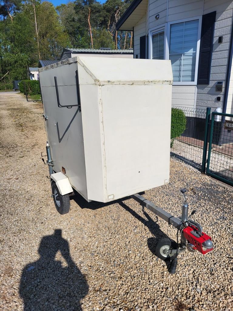 Kleine gesloten remorque , aanhangwagen, Enlèvement