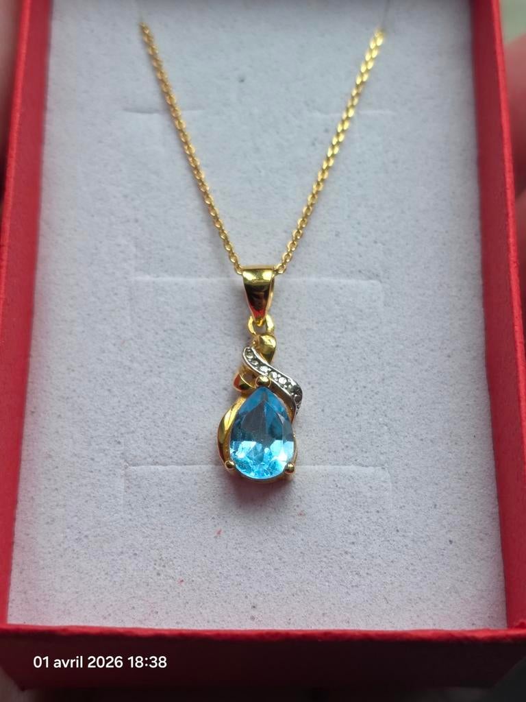 Pendentif en argent massif plaqué or avec topaze bleue, Neuf, Jaune, Enlèvement, Avec pierre précieuse