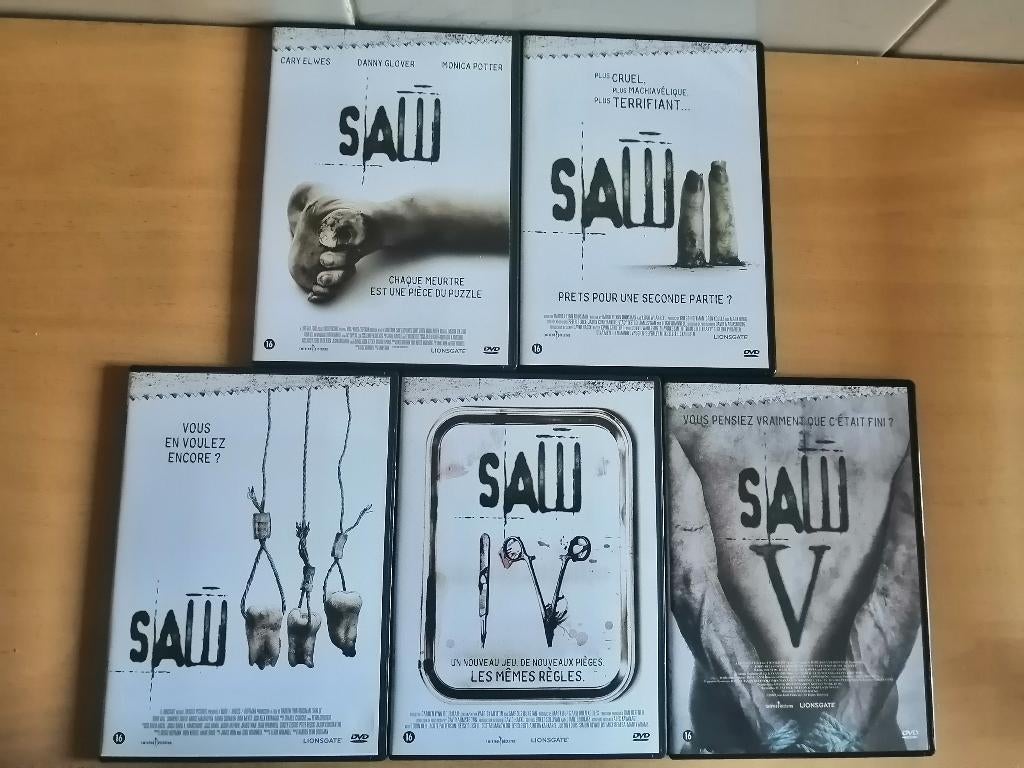 Lot 5 DVD SAW - célèbre franchise de films d'horreur - 1 à 5, CD & DVD, DVD | Horreur, Enlèvement ou Envoi, Comme neuf, Gore