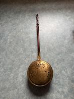 Koperen bedverwarmer, Enlèvement