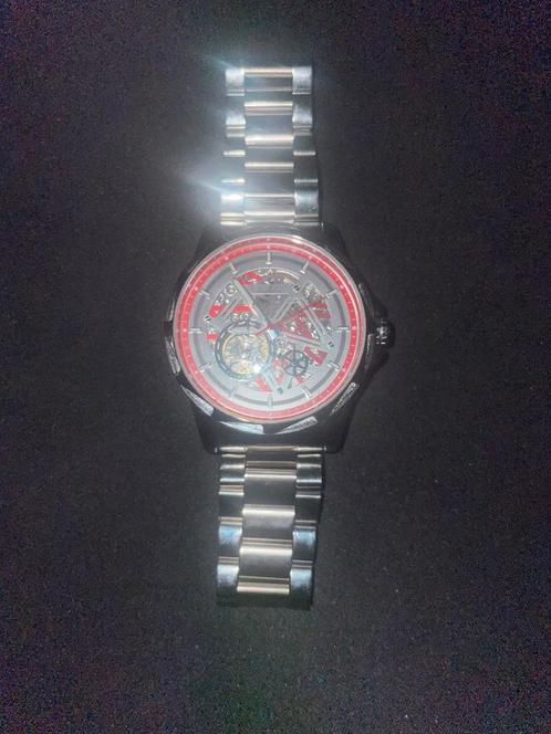 Montre homme Lushika Speedster mécanique cadran rouge, Handtassen en Accessoires, Horloges | Heren, Zo goed als nieuw, Staal, Staal