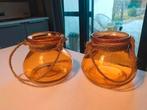 Twee oranjekleurige glazen potten, Tuin en Terras, Tuinvazen, Ophalen of Verzenden