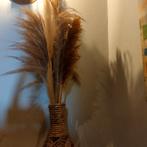 Rieten mand en droogbloemen, Enlèvement