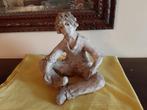 Statuette en terre cuite, Ophalen