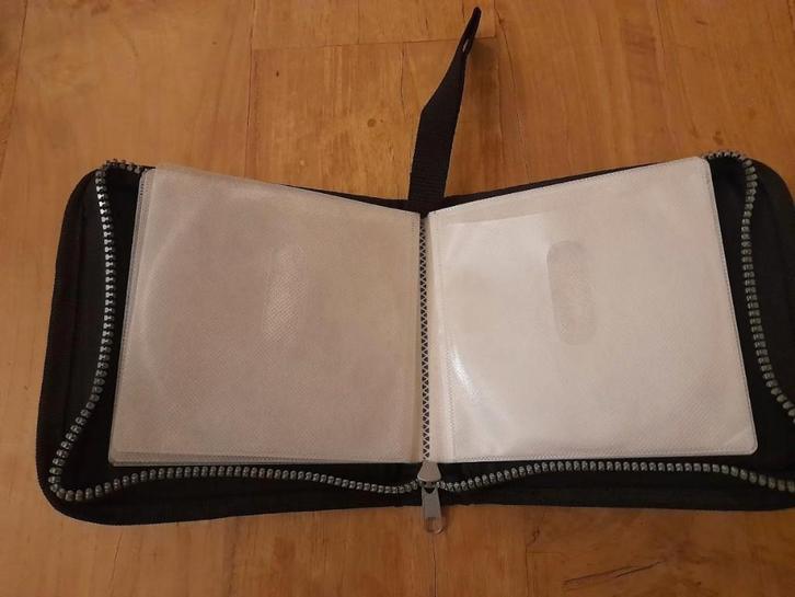 Housse de rangement DVD/CD – 12 pochettes – noire, CD & DVD, DVD | Autres DVD, Comme neuf, Tous les âges, Enlèvement ou Envoi