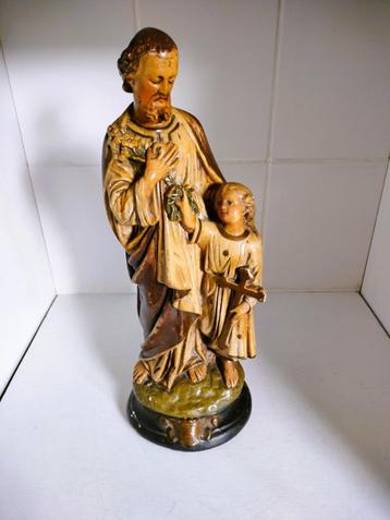 Sint-Jozef met het Kindje Jezus. Katholiek beeld. Religie. beschikbaar voor biedingen