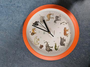 Klok met 12 dierengeluiden, 34cm diameter beschikbaar voor biedingen