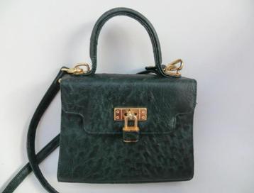 klein groen handtasje met draagriem en hangslotje  beschikbaar voor biedingen