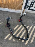 Paddock stand LV8 achterwiel, Ophalen
