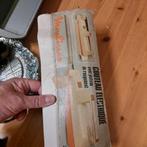 Electrisch mes, Ophalen