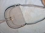 Michael Kors tas, Ophalen