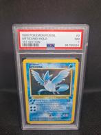 Articuno Holo 1st Edition Fossil PSA 7, Hobby en Vrije tijd, Verzamelkaartspellen | Pokémon, Ophalen of Verzenden, Zo goed als nieuw