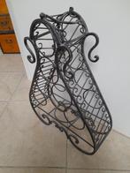 Gietijzeren wijnrek, Ophalen