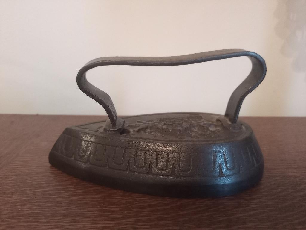 Ancien fers à repasser en fonte, Enlèvement