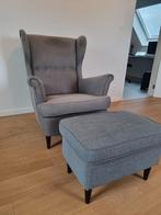 Donkergrijze fauteuil en voetenbank (Strandmon), Ophalen