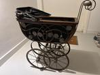 Antieke poppenwagen (gietijzer), Ophalen