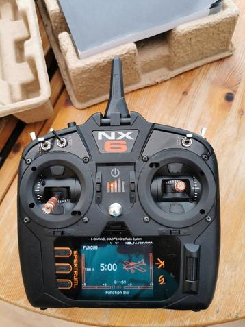 Spektrum NX6 met de laatste update==>14 kanaal beschikbaar voor biedingen