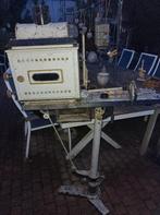 Antieke cinema projector, Ophalen