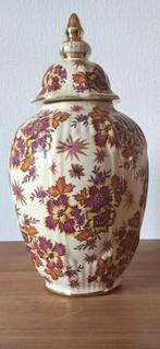 Joli vase avec couvercle, Enlèvement