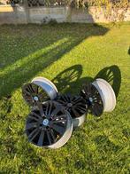 4 zwarte lichtmetalen velgen van fiat punto 15 inch 4x100, Auto-onderdelen, Banden en Velgen, Ophalen, Gebruikt