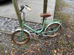 Oude opvouwbare kinderfiets, Ophalen