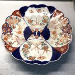 Assiettes et plat Imari, Enlèvement