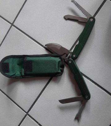 snoeischaar met  5 functies in zakje voor aan je riem beschikbaar voor biedingen