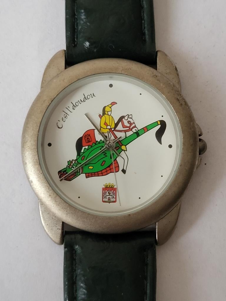 Vintage - Montre effige ducasse L'DouDou Mons - 18/06/2000, Enlèvement ou Envoi