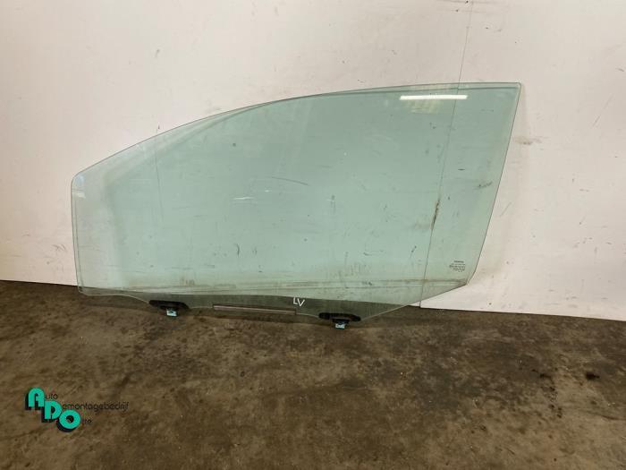 Portierruit 2Deurs links van een Toyota Yaris (Yaris 2 09-), Auto-onderdelen, Ruiten en Toebehoren, Toyota, Gebruikt, 3 maanden garantie