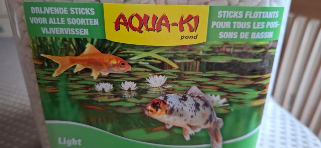 Doos met korrels voor de vissen  ,5 €, Dieren en Toebehoren, Ophalen