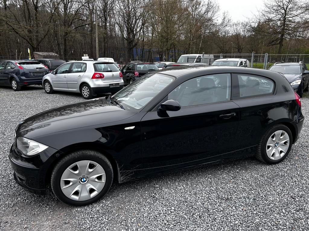 Bmw 116I 1.6 benzine km80.000 bj 2009, Auto's, BMW, Voorwielaandrijving, Zwart, 4 cilinders, 1600 cc