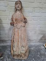 Houten madonna, Ophalen