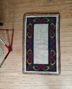 Vintage tapijt, Ophalen