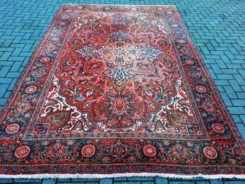 Groot Antiek Perzische tapijt (Iran-Heriz) met mooie patina 