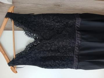 Zwarte jumpsuit maat 44 beschikbaar voor biedingen
