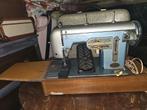 Rapide naaimachine in koffer, Ophalen