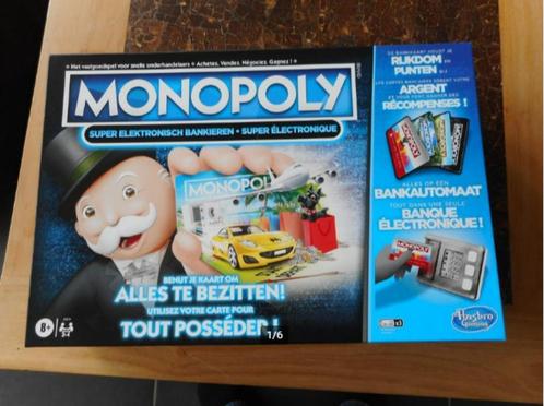 Monopoly Super Electronique, Hobby en Vrije tijd, Gezelschapsspellen | Overige, Zo goed als nieuw, Drie of vier spelers, Ophalen of Verzenden
