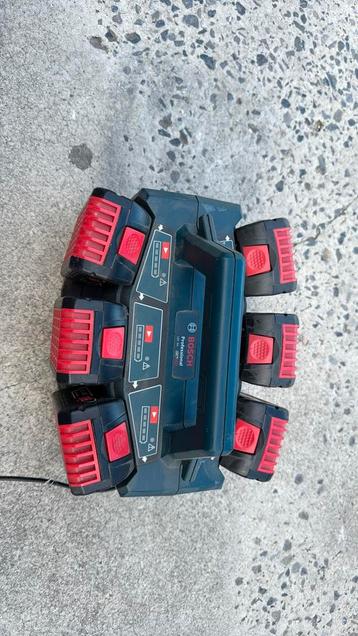 Batterijlader + batterijen beschikbaar voor biedingen