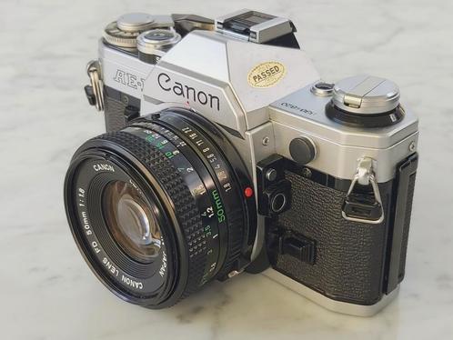 Canon AE-1 met 2 lenzen en tas, Audio, Tv en Foto, Fotocamera's Analoog, Zo goed als nieuw, Canon, Ophalen of Verzenden