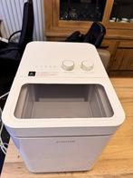 Ijsblokjesmachine, Ophalen