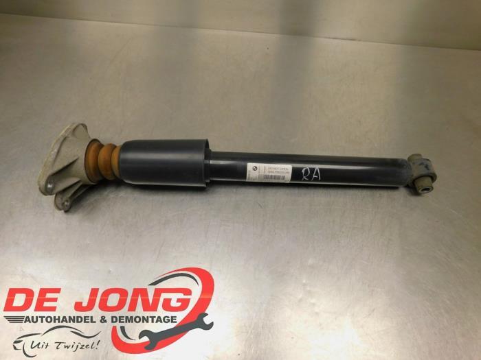 Amortisseur arrière droit d'un BMW 1-Serie, -, 3 mois de garantie, Utilisé, -